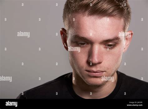 Young White Man Looking Down Head And Shoulders Stock Photo Alamy