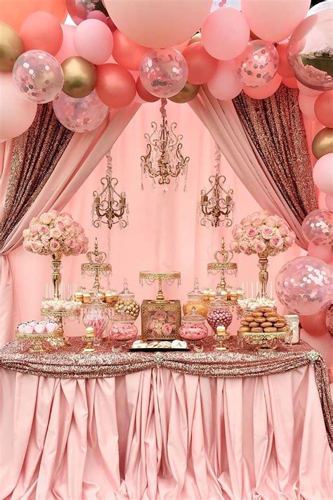 Whether it's your dress, cake or quinceanera decorations, rose gold is sure to combine with any other color and theme you choose for your special occasion. Pink and Gold Quinceañera Dessert Table styled by ...