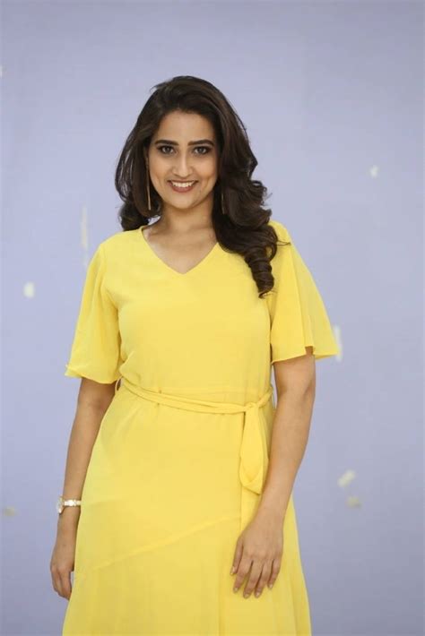 Manjusha Indian Tv Anchor Photo Shoot In Yellow Dress Glamorous