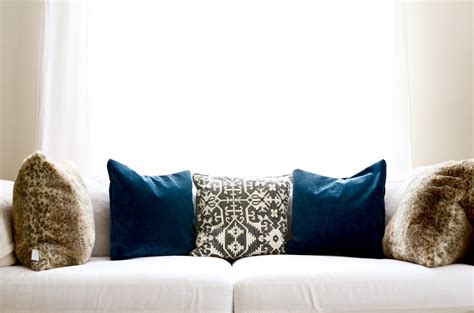 You had to have the blue velvet throw pillows at home. Blue Velvet in the Living Room | By Georgia Grace