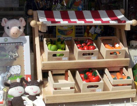 Ins'tent's market tents are made to last. Delightful wooden farmer's market stand with pretty ...