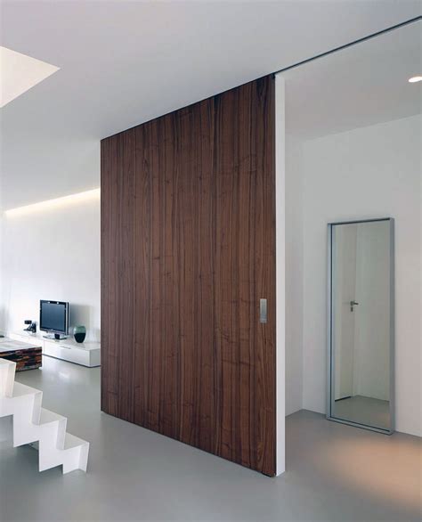 Sliding room dividers are an elegant solution for separating or dividing space within a room.they can be used to add privacy, separate a shared bedroom when kids need quiet study time, break up an especially large space or create a sleeping area in a studio apartment. Saving space with slidings doors