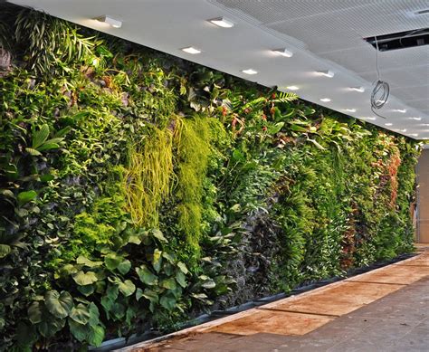 Here's a very stylish example to see what we mean. evollt.com | Vertical garden indoor, Vertical garden ...