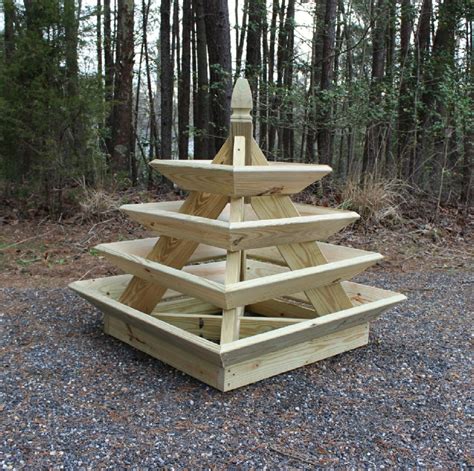 This step by step diy woodworking project is about simple strawberry planter plans. How to build a pyramid strawberry planter. DIY plans.