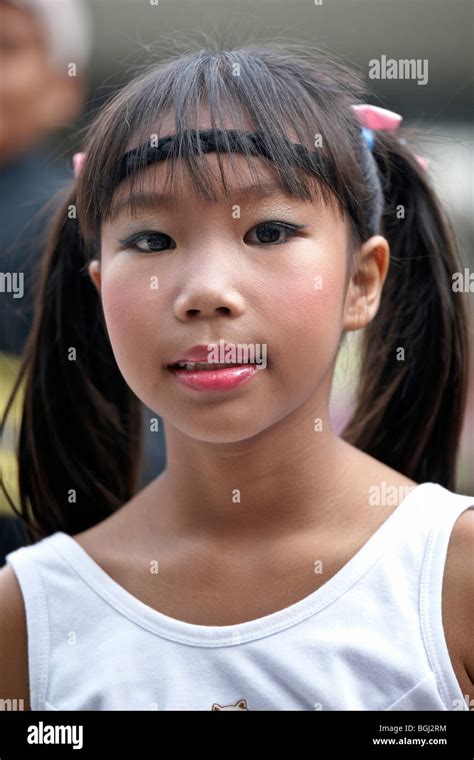 Portrait Of A Thailand Child With Face Make Up For A School Event