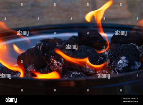 Bbq Coals Burning On A Barbeque Stock Photo Alamy