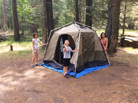 Simply press the hub/base together and the tent opens. The kids pretending to help put up the tent - Lone Locust ...
