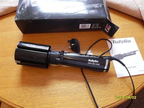 Inexpensive and easy to use. Babyliss Big Hair 50 mm Rotating Brush Hot Air Dryer ...