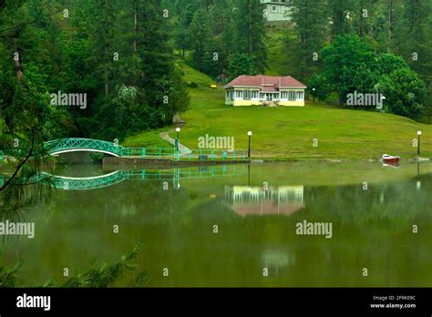 Hdr Reflection Of Tourist Resort In Banjosa Lake In Rawalakot District