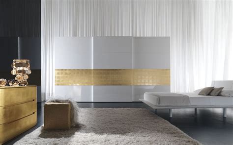Looking for storage that maintains the fluidity in the kids' room, a stackable bookcase keeps their reading material close. White Wardrobe with Gold Strip | Master Bedroom Storage ...
