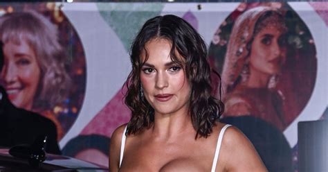 Newly Single Lily James Almost Spills Out Of Busty Dress At Premiere
