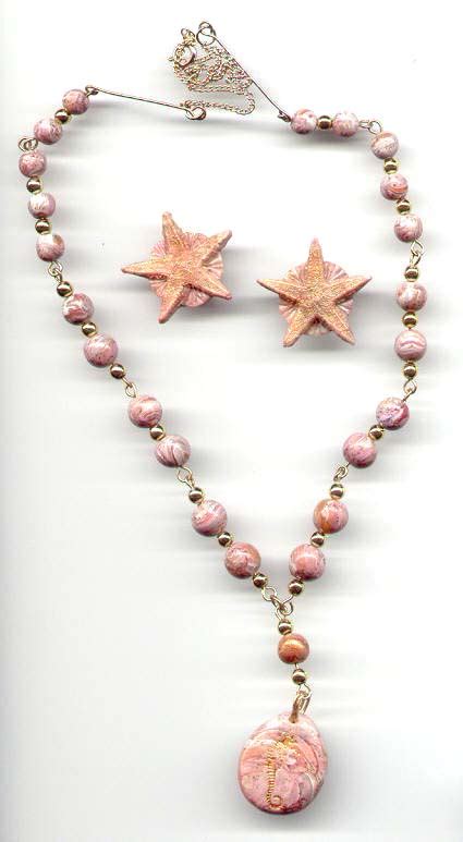 Maybe you would like to learn more about one of these? Polymer Clay Pink Marble Necklace - Sky Grazer Designs