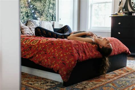 An Energizing Yoga Sequence You Can Do In Bed Mindbodygreen