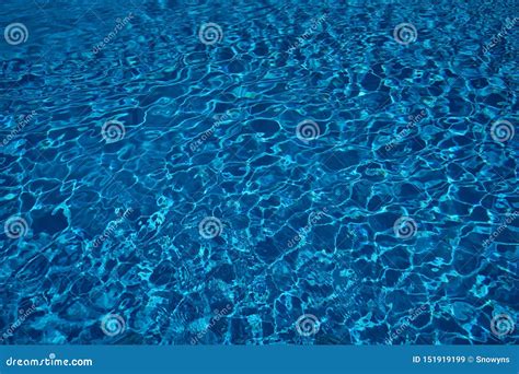 Swimming Pool Clear Blue Water Surface With Sparkling Light Reflections