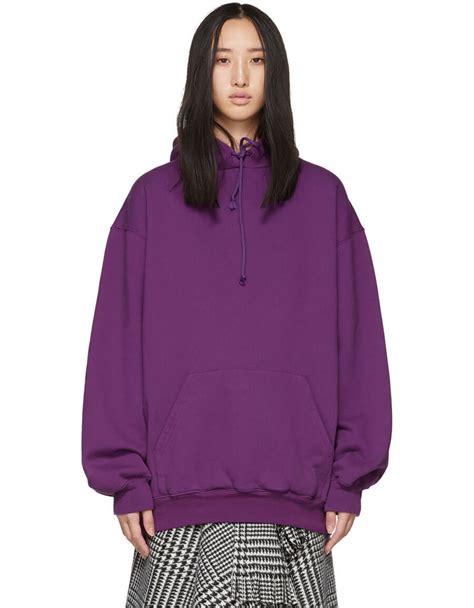 Spanish haute couturier cristòbal balenciaga's innovative designs, known for their sculptural volumes and strict modernity, cemented his reputation as one of the 20th century's most legendary designers. BALENCIAGA Purple Logo Back Hoodie · VERGLE