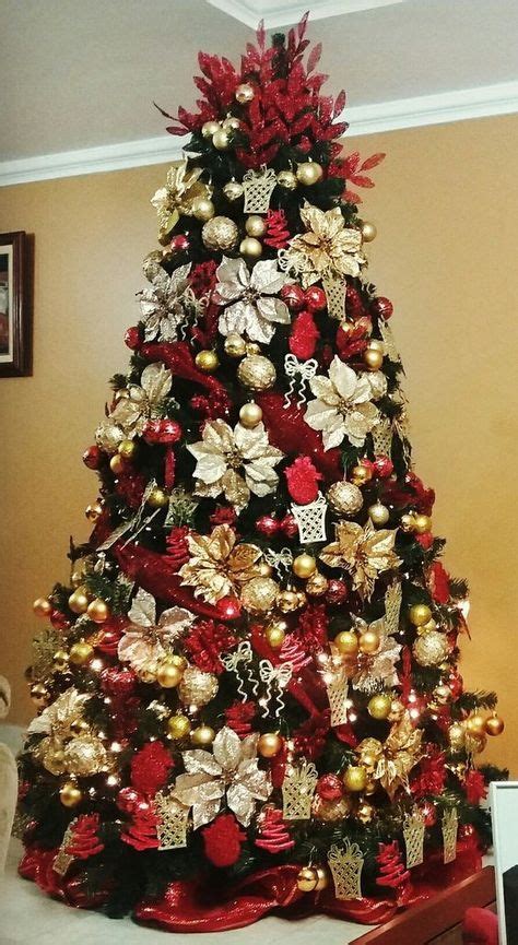 Adornos de navidad de color rojo y plateado con originales renos realizados en alambre forrados con papel madera y en el centro un gorro de santa claus. arbol de navidad plateado dorado y rojo | Decoracion ...