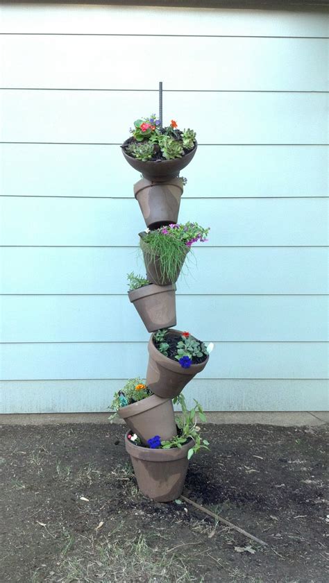 47 Best Tipsy Pot Planters Images On Pinterest Backyard