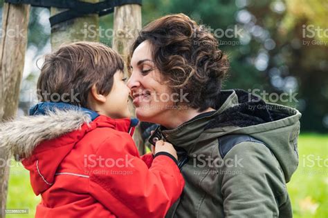 Closeup Of A Mother Rubbing Noses With Her Son Fotografie Stock E