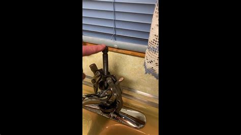 Faucet is leaking or dripping at the base, near the countertop. Kohler kitchen faucet Model A112.18.1removal - YouTube