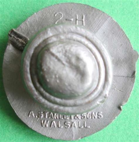 A Plastic Air Training Corps Button Hole Badge