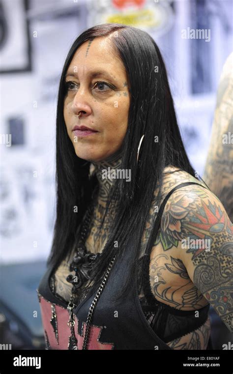 A Heavily Tattooed Woman At The 10th International London Tattoo Convention Tobacco Dock