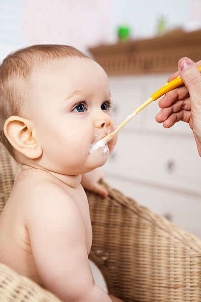 1000 Baby Eat Yogurt Stock Photos Pictures And Royalty Free Images