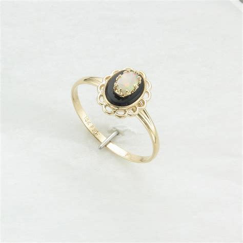 Oval Black Onyx And Opal Ring Set In 10k Yellow Gold