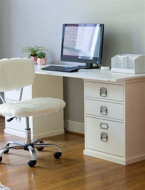 You might think you won't need this furniture piece if you're not working from home, right? Desk Made with File Cabinets - Savvy Apron