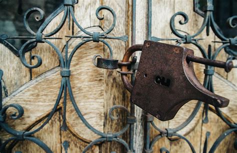 Rustic Lock On Wooden Door Photograph By Alexandre Rotenberg