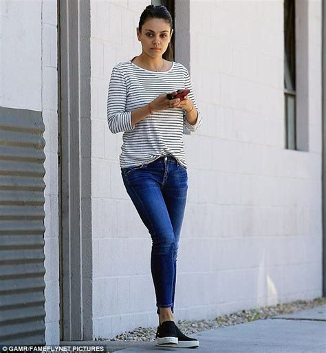 Mila Kunis Shows Off Her Incredible Form In Denim With A Striped Top