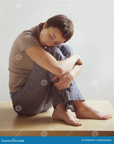 Beautiful Woman Sitting Hugging His Knees Stock Images Image 35356794