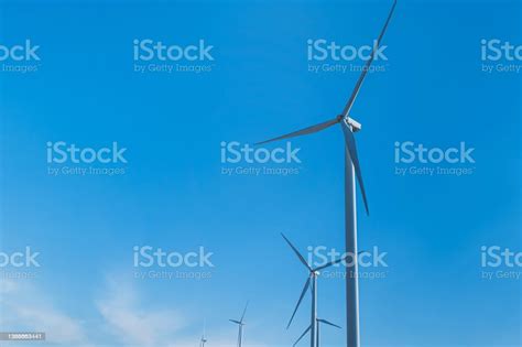 Wind Turbine Farm On Blue Sky Background Wind Power Renewable Energy