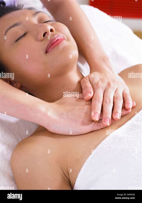 Woman Enjoying Facial Massage Stock Photo Alamy