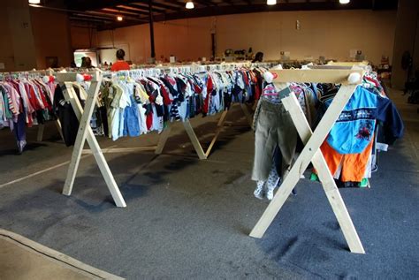 If you are selling clothes at your garage sale, it is important to display them well so that buyers can find sizes and styles quickly. Make clothes racks...tickles giggles racks | Yard sale clothes rack, Diy clothes rack, Yard sale diy