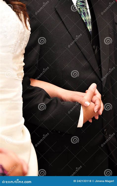 Couple Holding Hands While Getting Married Stock Photo Image Of