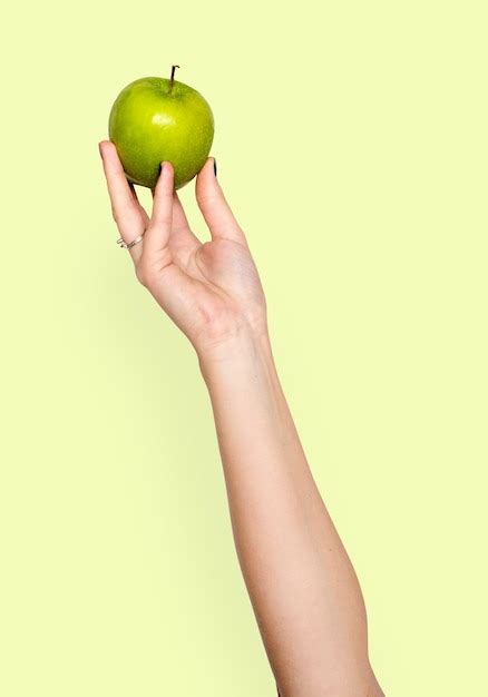 Premium Psd Hand Holding Apple