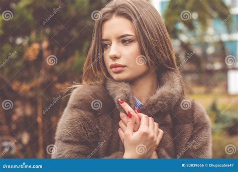 Pretty Teen Girl Is Wearing Fur Coat Stock Photo Image Of Cheerful