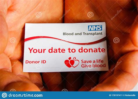 Nhs Blood And Transplant Donor Card In Hands Editorial Photo Image Of