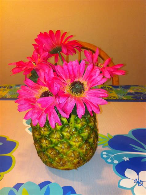 Pineapple centerpiece  Pineapple centerpiece, Luau wedding, Luau party