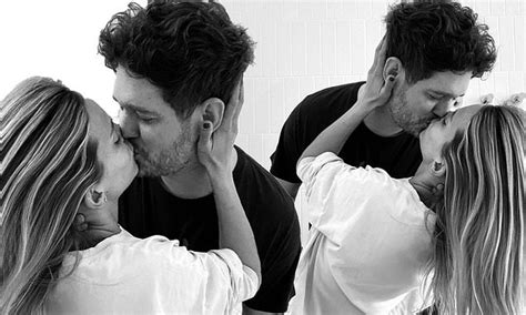 Michael Buble And His Wife Luisana Lopilato Celebrate International Kissing Day In Steamy Snap