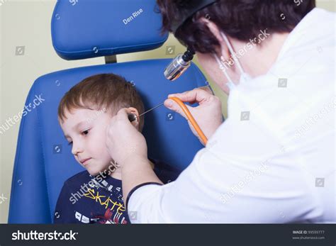 Medical Otitis Examination Of A Child At A Ear Nose Throat Doctor Stock