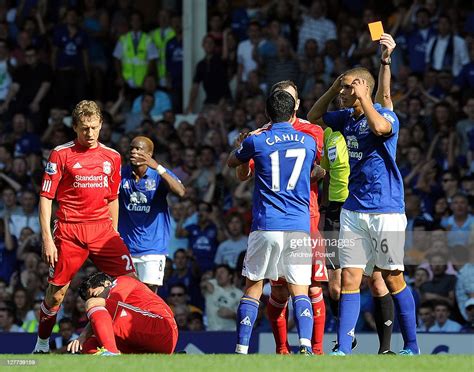 Jack Rodwell Of Everton Gets A Red Card For A Foul On Luis Suarez Of