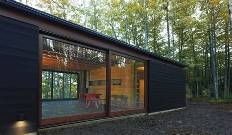 Linear Cabin Is An Elegant Hideaway In The Woods Of Wisconsin