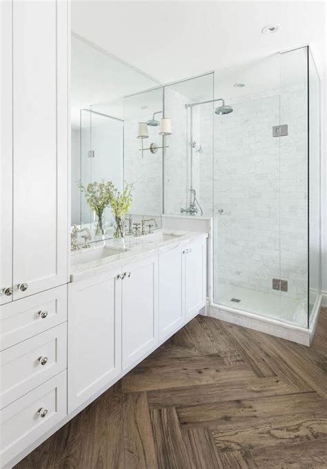 Master Bathroom With Herringbone Wood Floor Marble Shower And