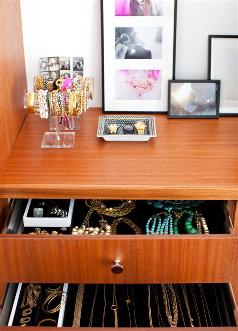 The mere sight of that dresser seems to be a nightmare when everything resting there only adds to the cluttering up of the bedroom. jewelry organization: complete! - A House in the Hills