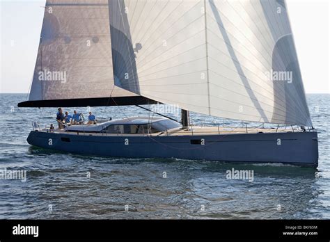 A Crew Races A Modern Ocean Going Sailing Yacht Stock Photo Alamy