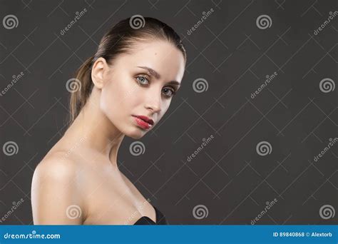 The Beautiful Girl Naked Shoulders Portrait On A Gray Background Stock Photo Image Of
