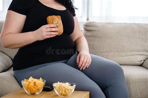 Fat Woman Watching Series At Tv Eating Junk Food Stock Photo Image Of Introvert Laziness