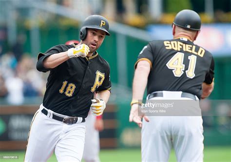 Pittsburgh Pirates Second Baseman Neil Walker Is Greeted By Third