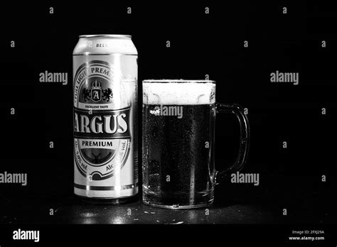 Can Of Argus Beer And Beer Glass On Dark Background Illustrative